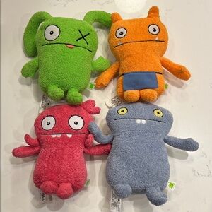 Lot of four Uglydolls plush stuffed animal toys